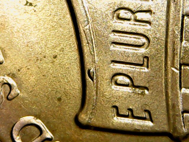 I-Found-11-2021-Pennies-In-A-Roll-With-A-Raised-Dot-On-Each-Shield-Rim.-Are-They-Worth-Keeping?